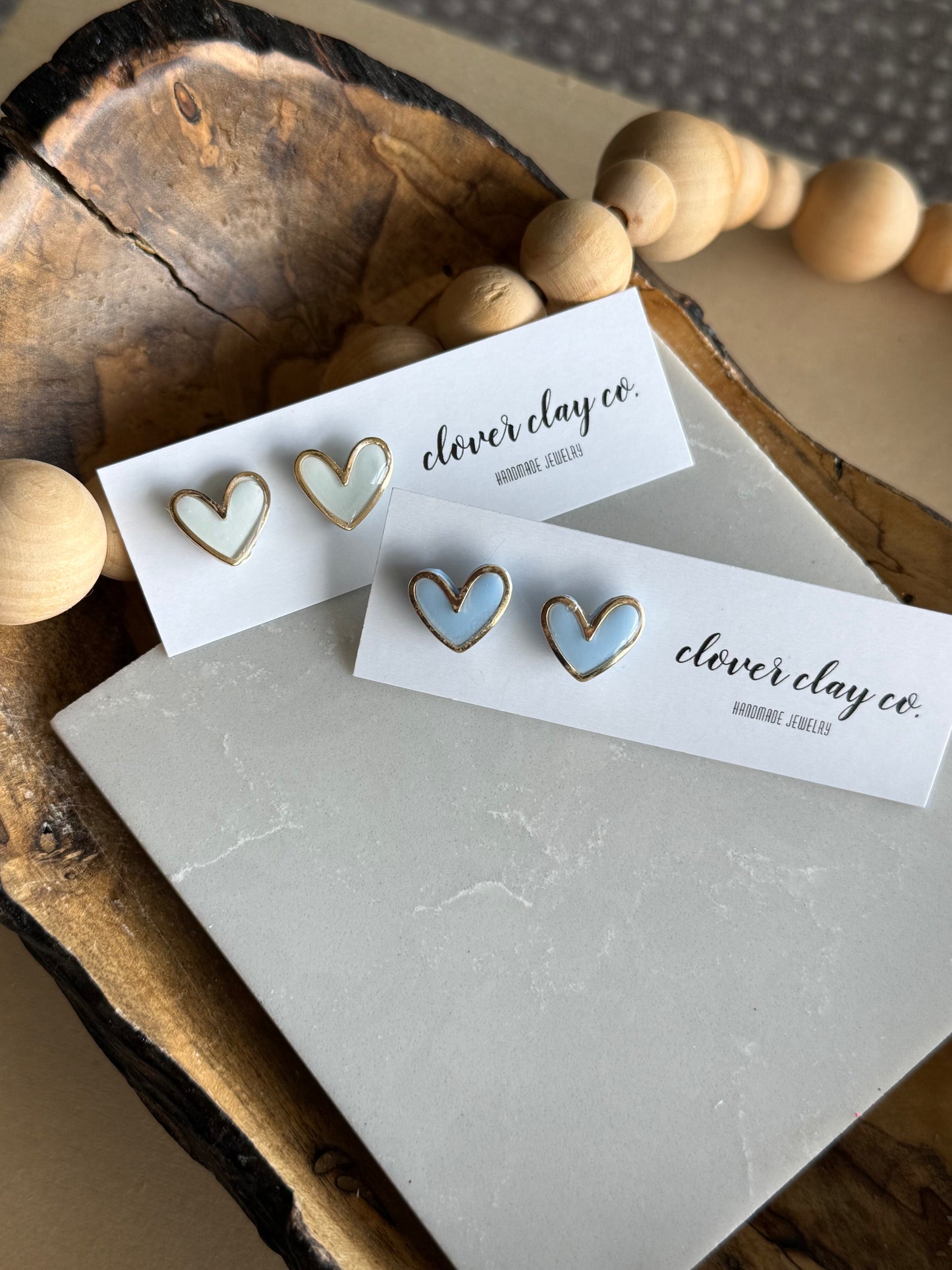 Gold Rimmed Heart Studs