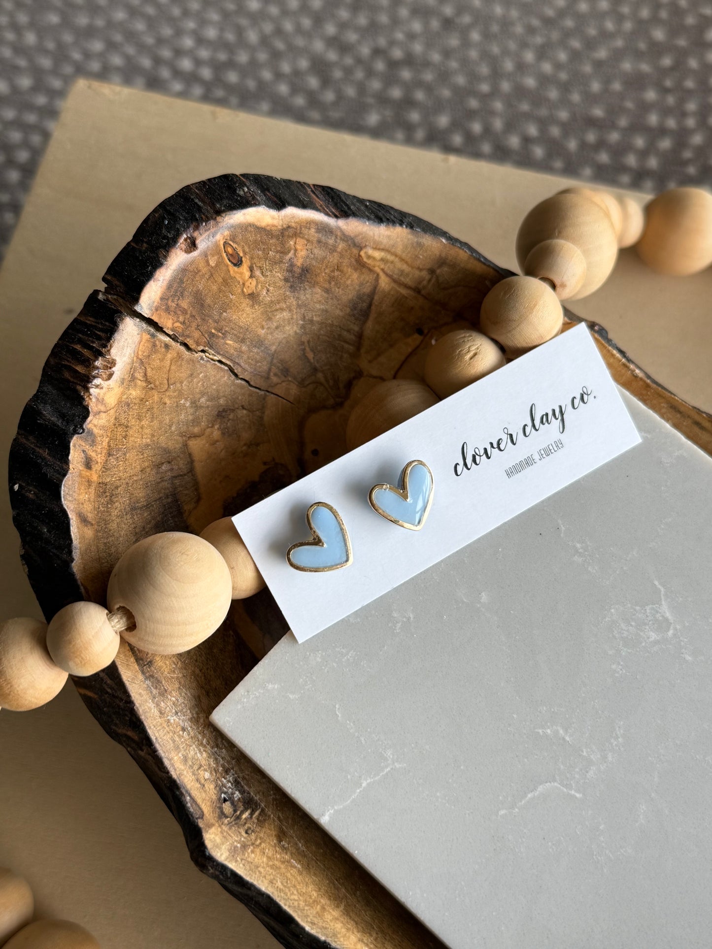 Gold Rimmed Heart Studs