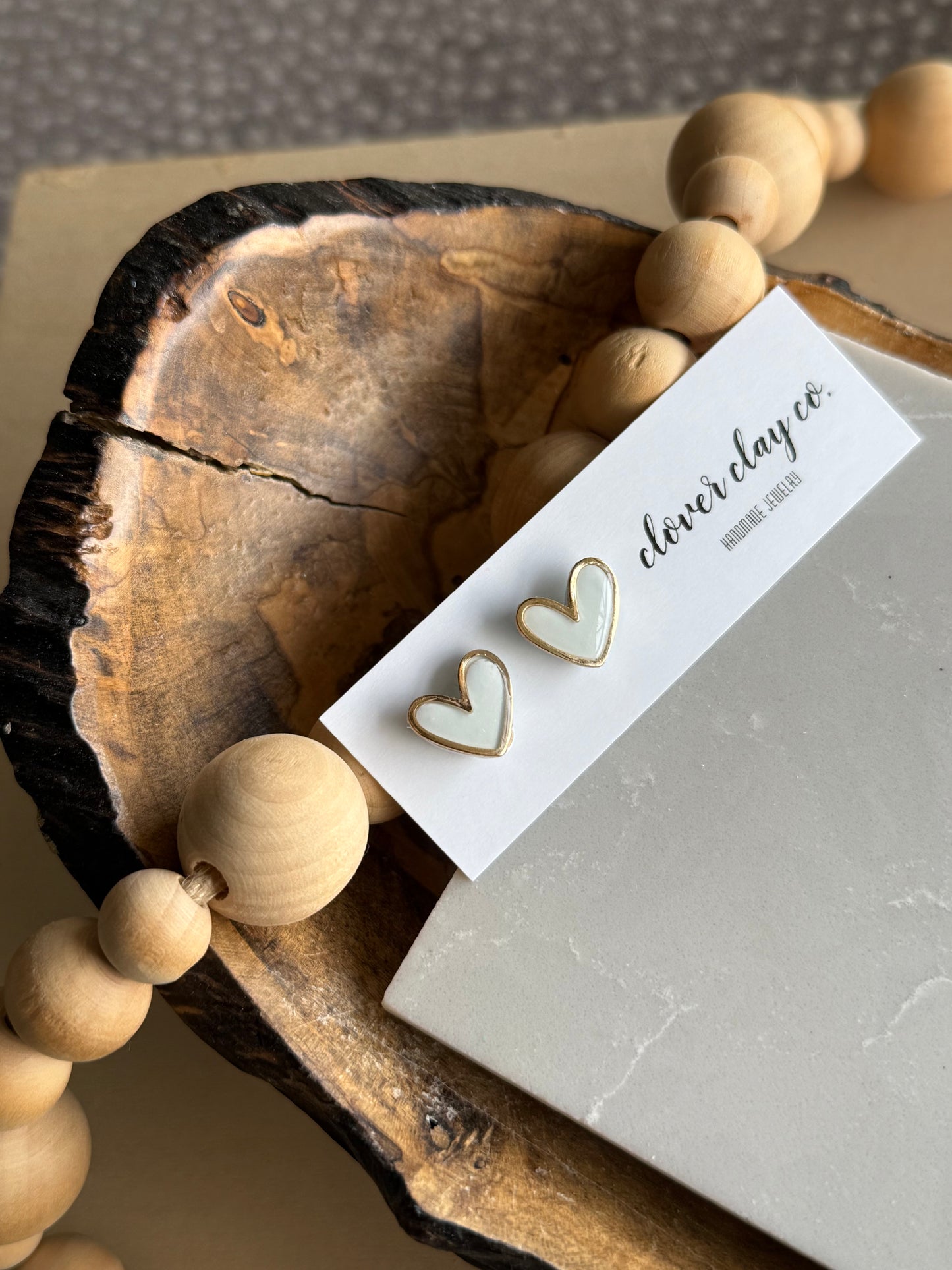 Gold Rimmed Heart Studs